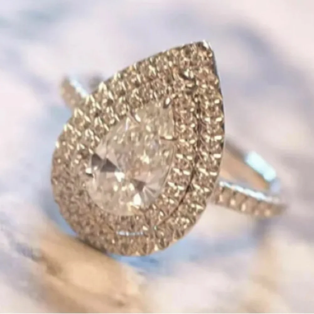 Gorgeous 3.75 ct. t.w. Pear & Round Cut Double Halo Ring - Picture 3 of 16